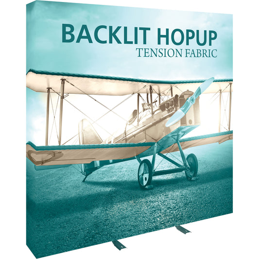 A Hopup™ 3×3 straight pop-up display set up as a 7½′ × 7½′ smooth tension fabric graphic wall with backlighting, facing right. Perfect for exhibits at trade shows and retail.