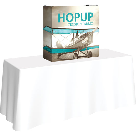 A Hopup™ 1×1 straight pop-up tabletop display set up as a 2½′ × 2½′ smooth tension fabric graphic, facing right. Perfect for advertising at meetings and retail.